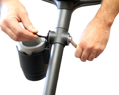 Cup holder nut being tightened into place.