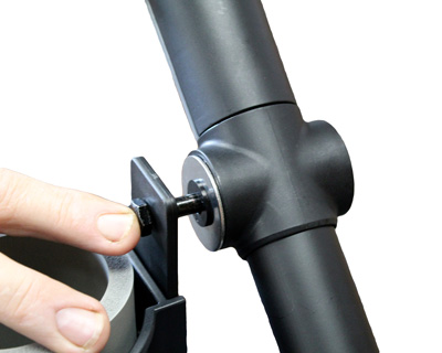 Cup holder, washers, and bolt sliding into Golfstream accessory station.